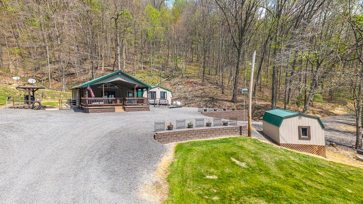 Image for SOLD $385,000 - Impressive Cabin with Guest House on 46 Acres in Harrison County