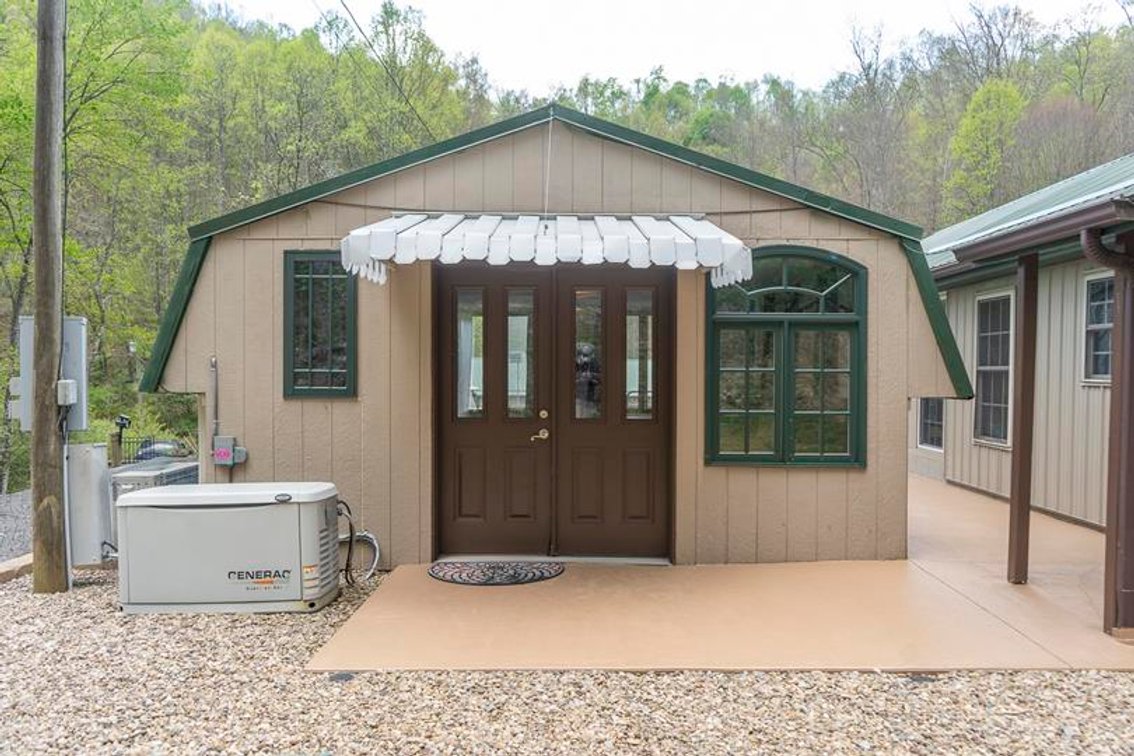 Image for SOLD $385,000 - Impressive Cabin with Guest House on 46 Acres in Harrison County