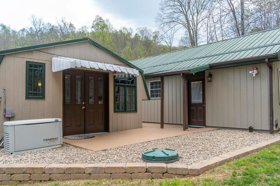 Image for SOLD $385,000 - Impressive Cabin with Guest House on 46 Acres in Harrison County