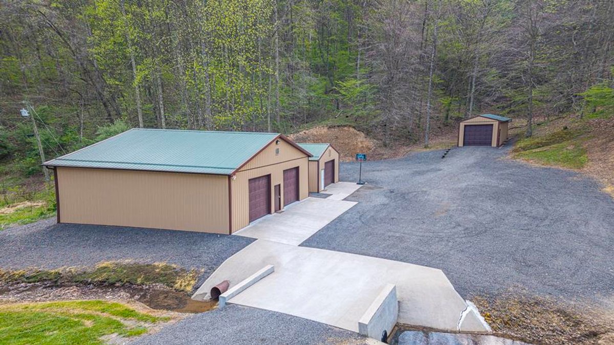 Image for SOLD $385,000 - Impressive Cabin with Guest House on 46 Acres in Harrison County