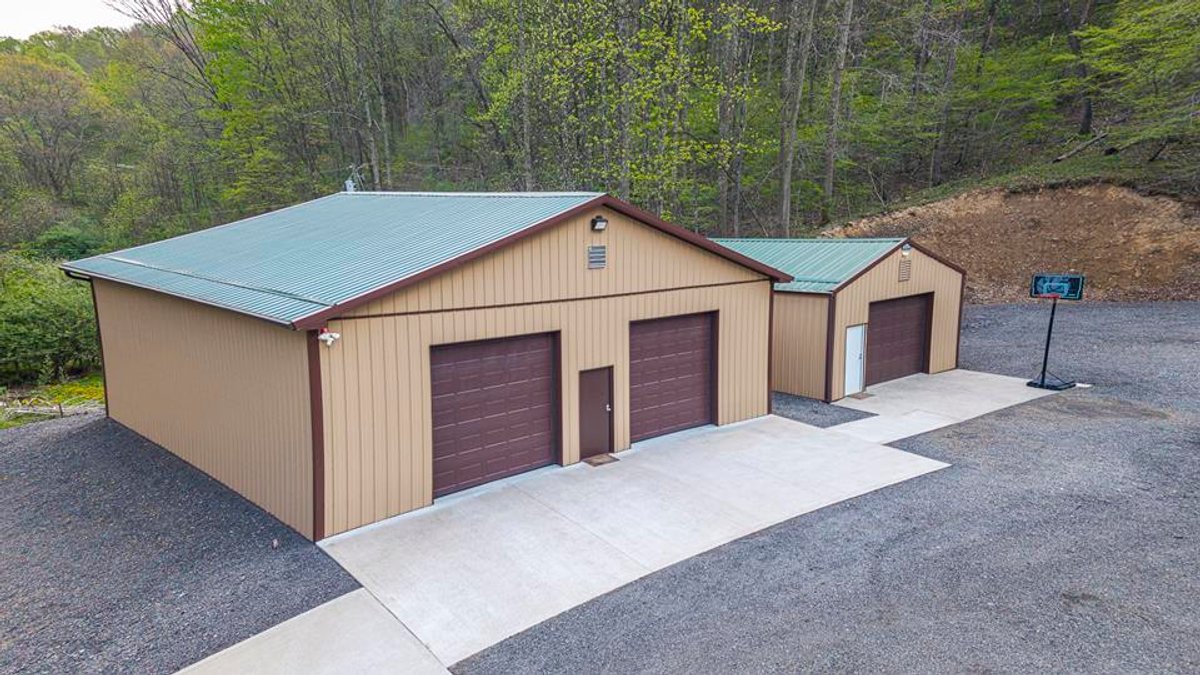 Image for SOLD $385,000 - Impressive Cabin with Guest House on 46 Acres in Harrison County