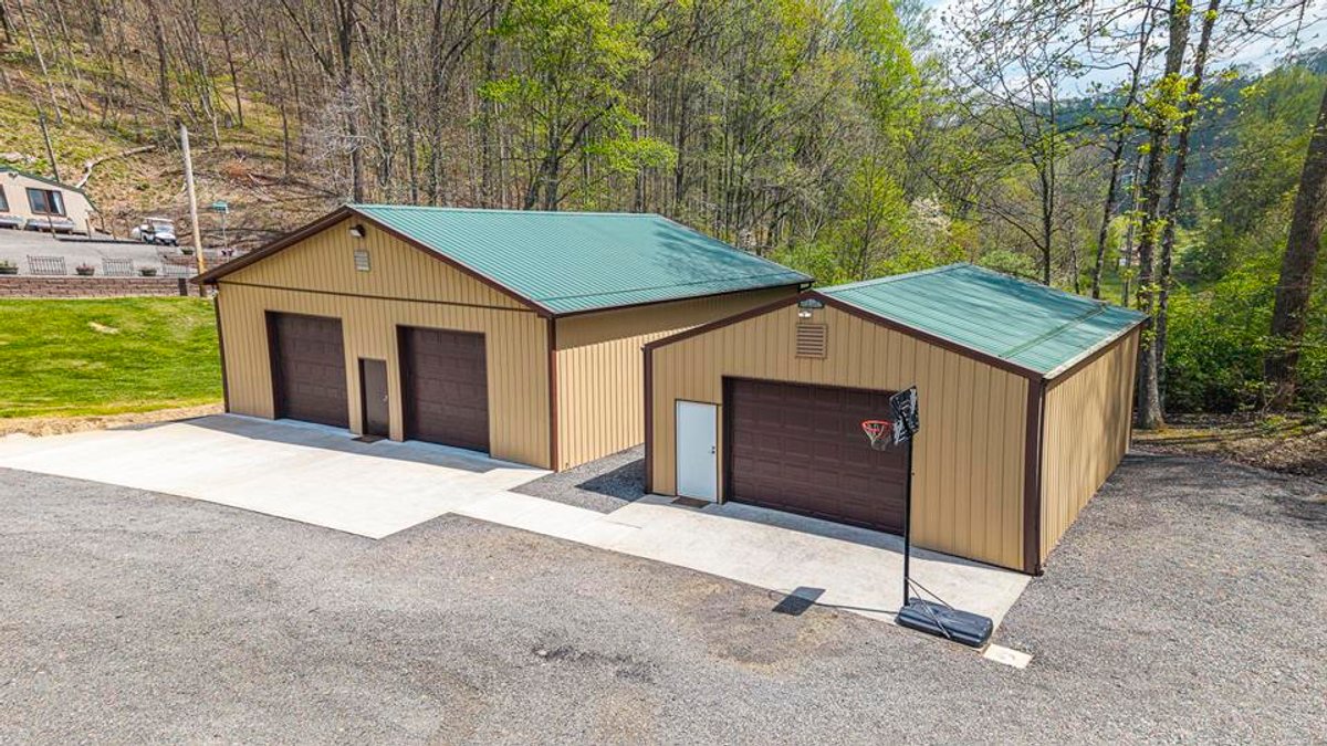 Image for SOLD $385,000 - Impressive Cabin with Guest House on 46 Acres in Harrison County