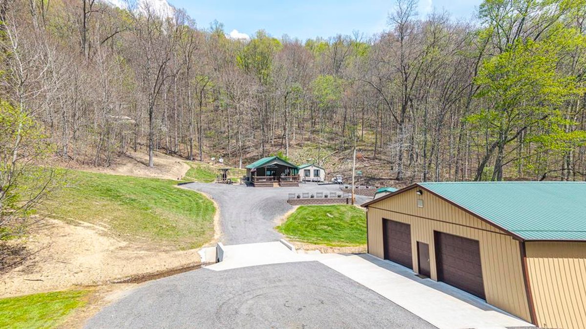 Image for SOLD $385,000 - Impressive Cabin with Guest House on 46 Acres in Harrison County