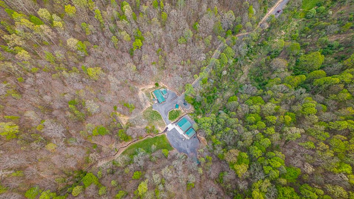 Image for SOLD $385,000 - Impressive Cabin with Guest House on 46 Acres in Harrison County