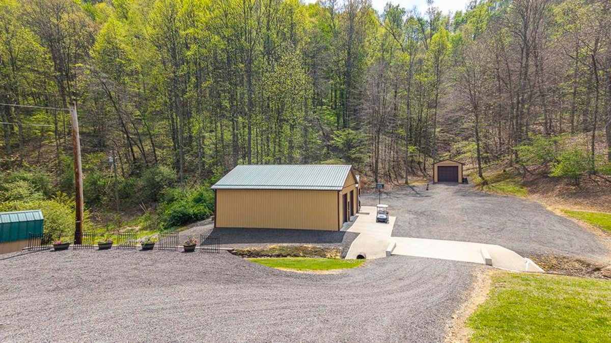 Image for SOLD $385,000 - Impressive Cabin with Guest House on 46 Acres in Harrison County