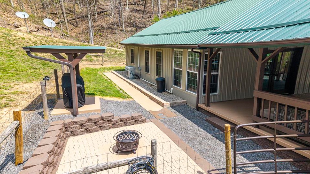 Image for SOLD $385,000 - Impressive Cabin with Guest House on 46 Acres in Harrison County