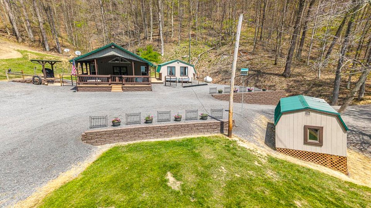 Image for SOLD $385,000 - Impressive Cabin with Guest House on 46 Acres in Harrison County