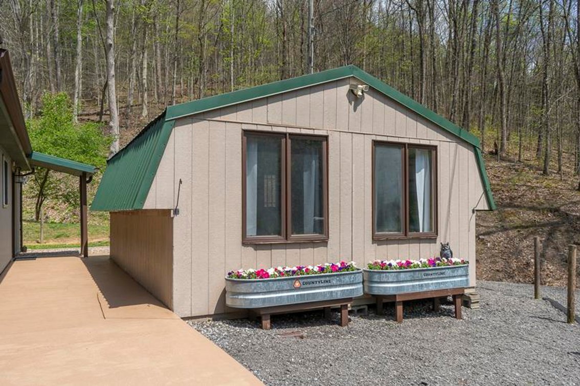 Image for SOLD $385,000 - Impressive Cabin with Guest House on 46 Acres in Harrison County