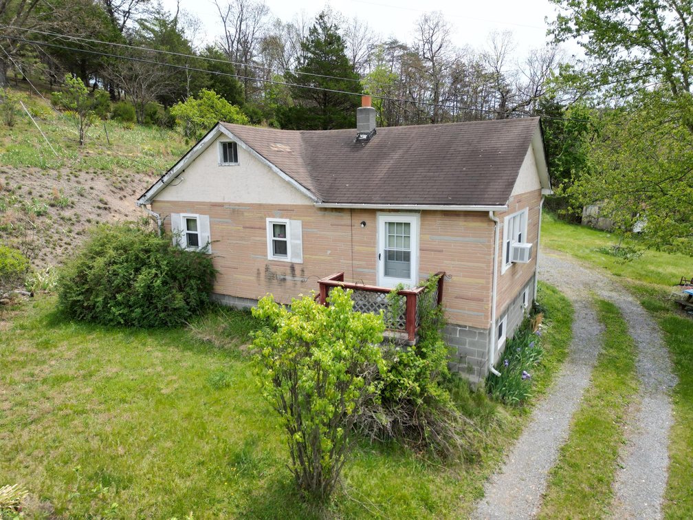 Image for SOLD $88,000 - Rustic Mountain Cottage on Nearly 2.5 Acres in Petersburg Selling to the Highest Bidder