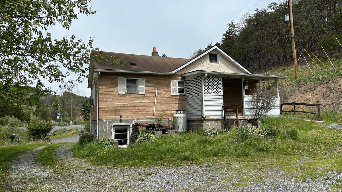 Image for SOLD $88,000 - Rustic Mountain Cottage on Nearly 2.5 Acres in Petersburg Selling to the Highest Bidder