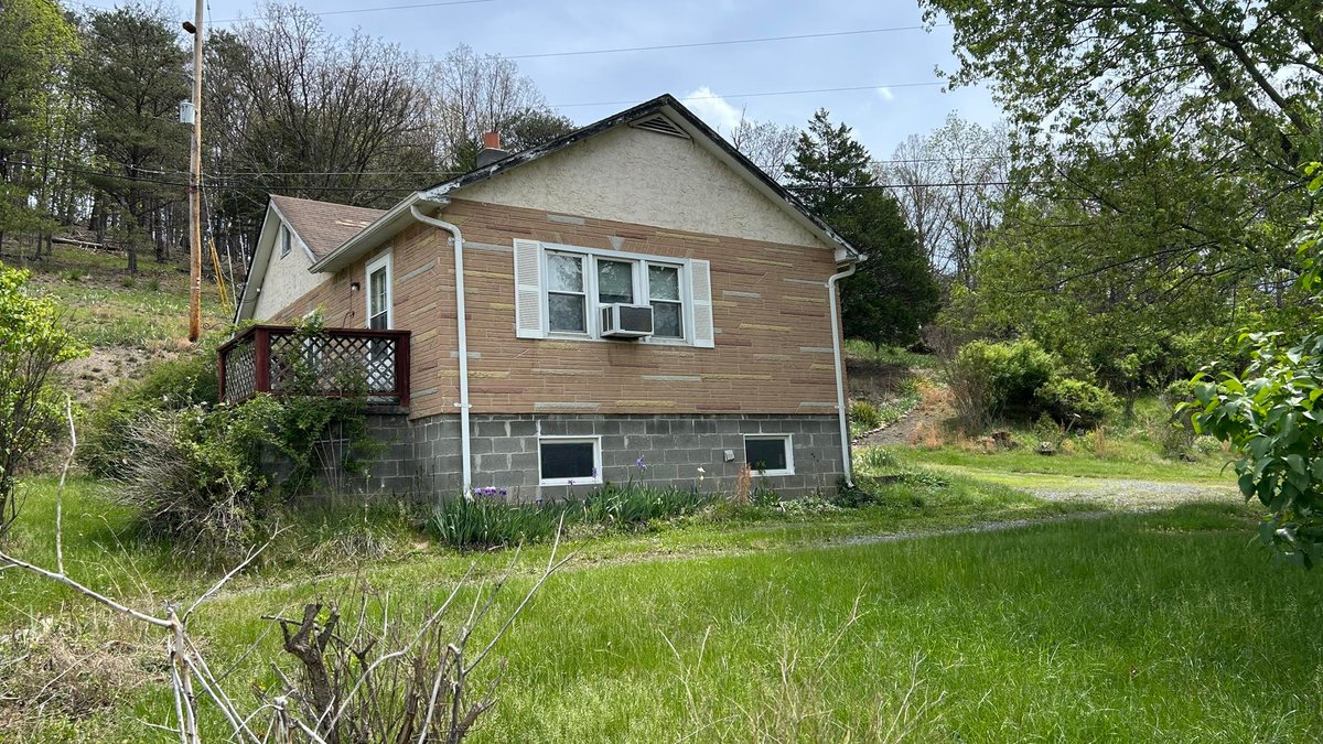 Image for SOLD $88,000 - Rustic Mountain Cottage on Nearly 2.5 Acres in Petersburg Selling to the Highest Bidder