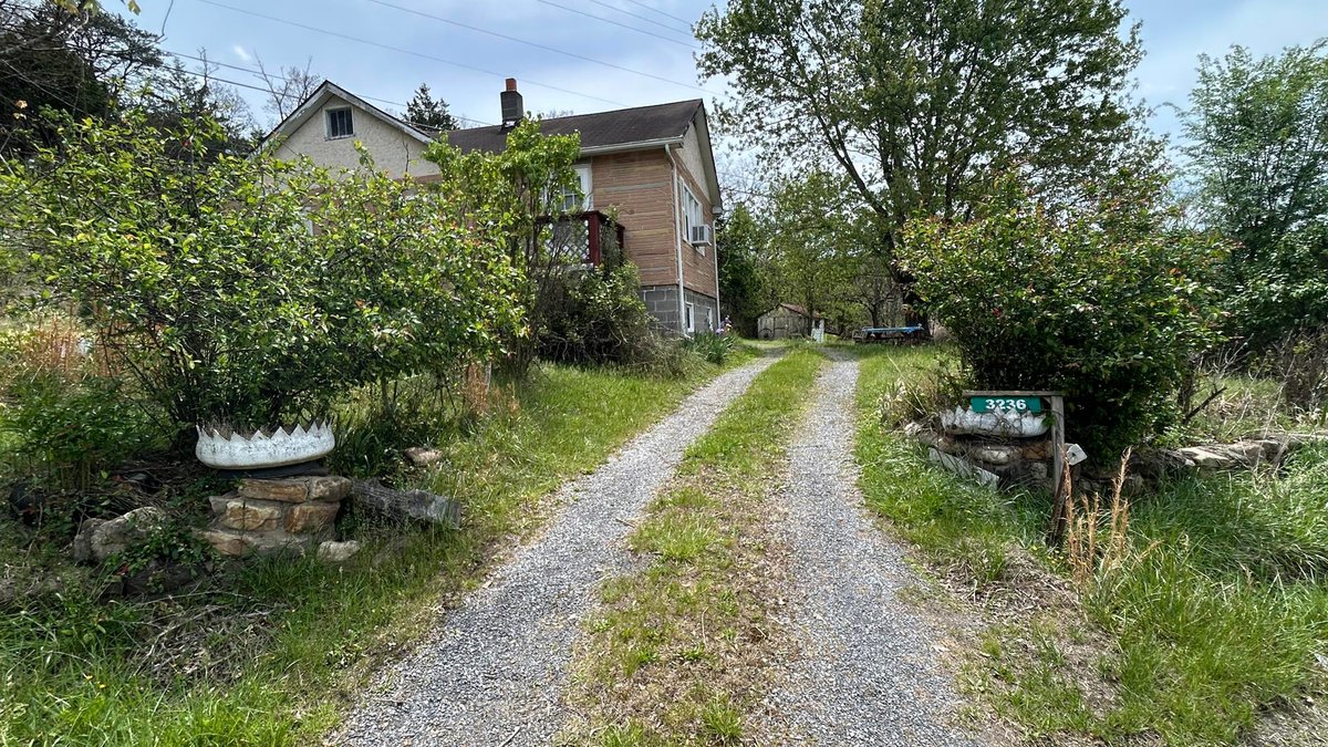 Image for SOLD $88,000 - Rustic Mountain Cottage on Nearly 2.5 Acres in Petersburg Selling to the Highest Bidder