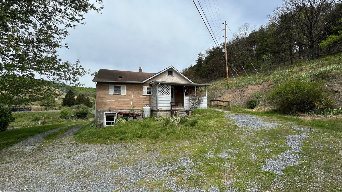 Image for SOLD $88,000 - Rustic Mountain Cottage on Nearly 2.5 Acres in Petersburg Selling to the Highest Bidder