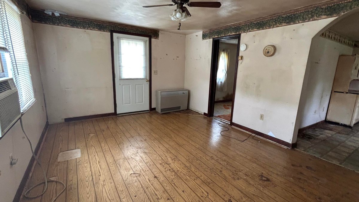 Image for SOLD $88,000 - Rustic Mountain Cottage on Nearly 2.5 Acres in Petersburg Selling to the Highest Bidder