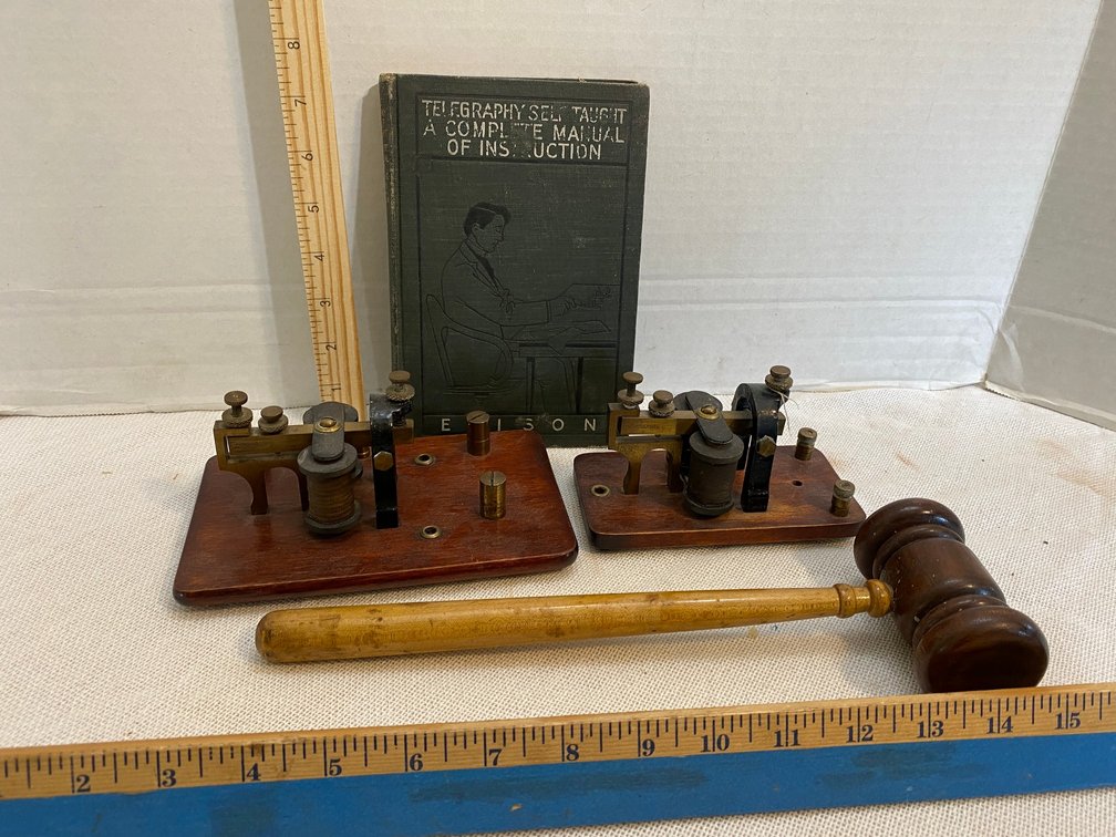 Vintage telegraph sounders, Edison book, gavel