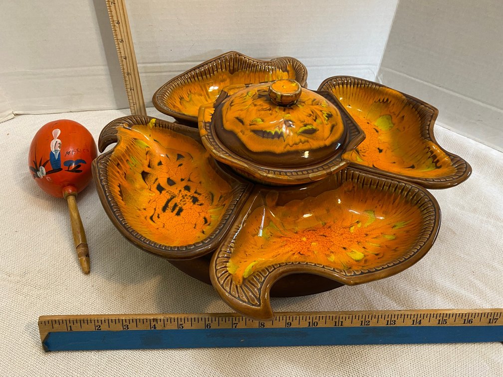 Ceramic type lazy Susan marked CAL.144 USA, Mexican maraca