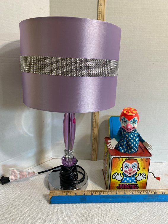 Early tin Jack in the Box, purple vanity lamp