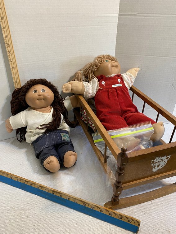 2 Cabbage Patch dolls, rocking doll cradle