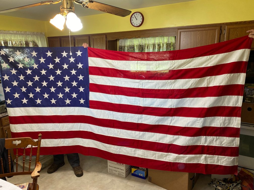 Large American flag, small history of the US of America flag set