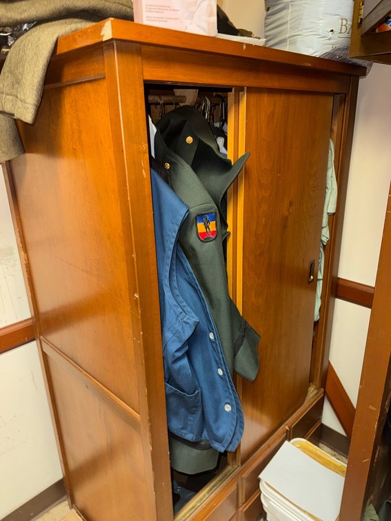 Military Jackets in Wooden Wardrobe