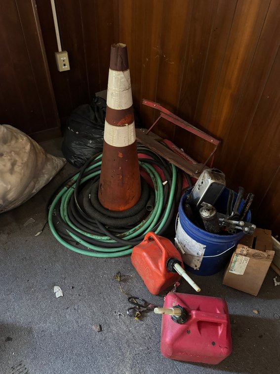 Gas cans, traffic cone
