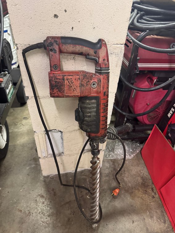 Milwaukee corded heavy-duty rotary hammer / demolition drill.