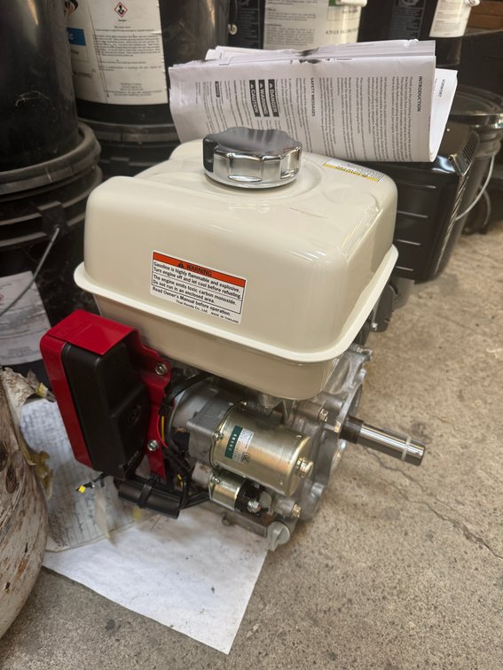 Gasoline-powered engine with electric start.