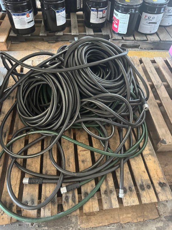 Assorted coiled hoses