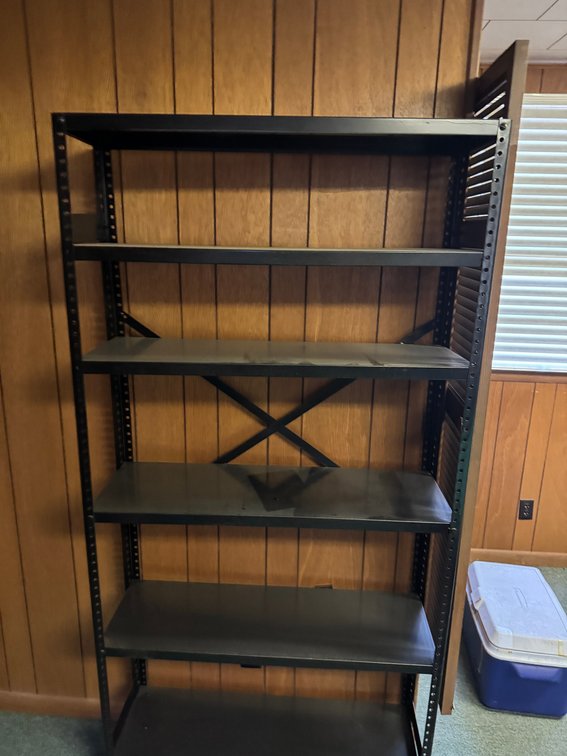 Heavy-duty metal shelving unit with multiple adjustable shelves and reinforced frame.