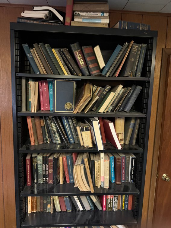Collection of books, bring boxes to load
