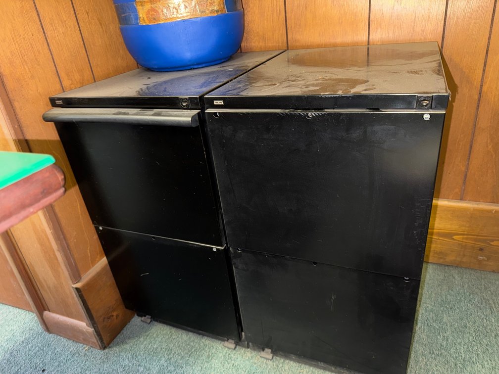 Pair of black compact filing cabinets.