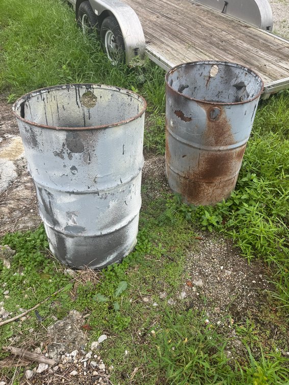 Two used steel drums/barrels