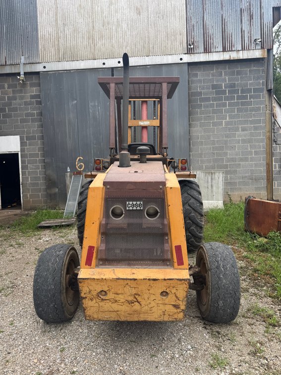 Case industrial forklift with pneumatic tires and overhead guard.