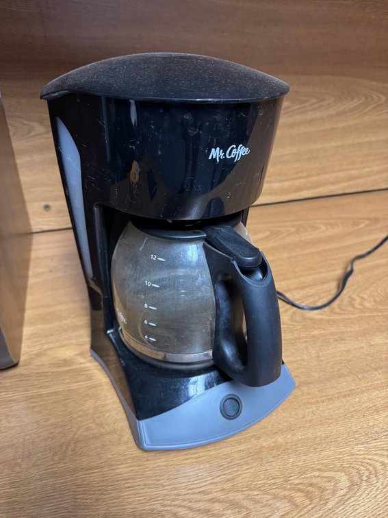Mr. Coffee 12-cup drip coffee maker with glass carafe.