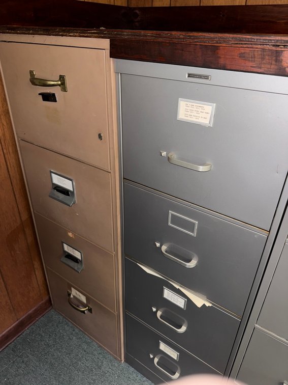 Two metal filing cabinets