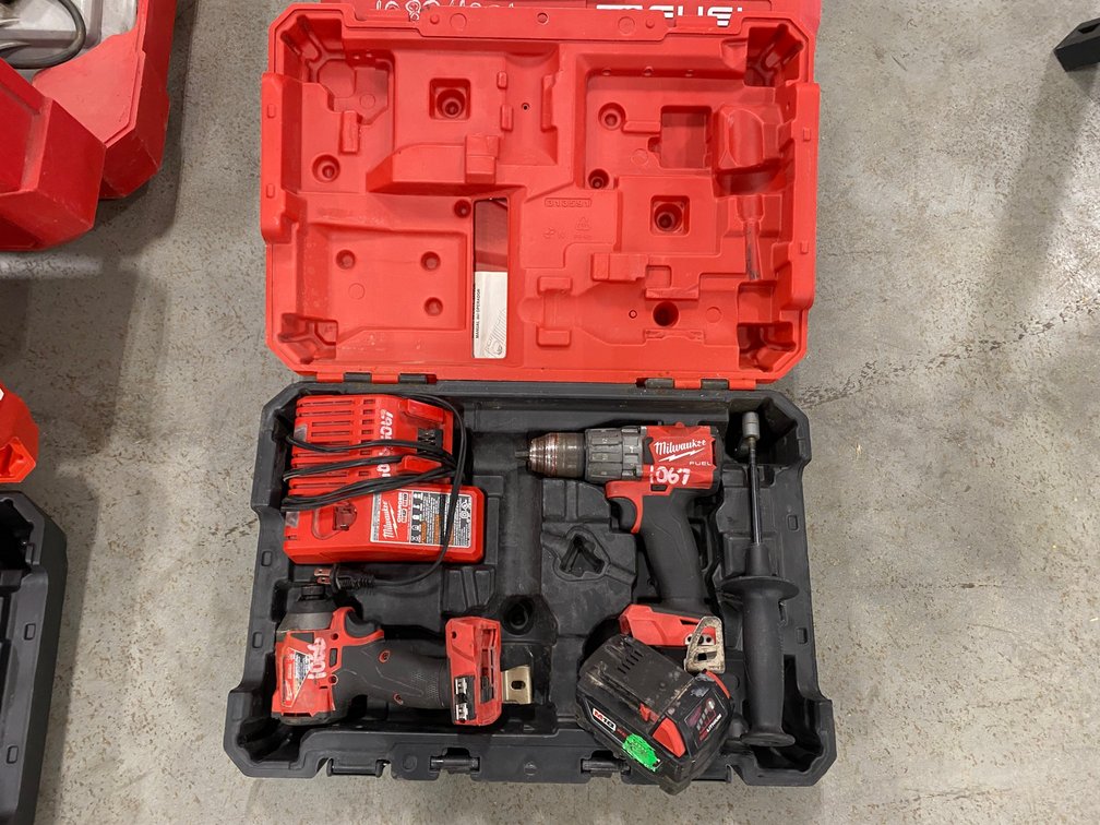 Milwaukee fuel impact and drill with charger and battery