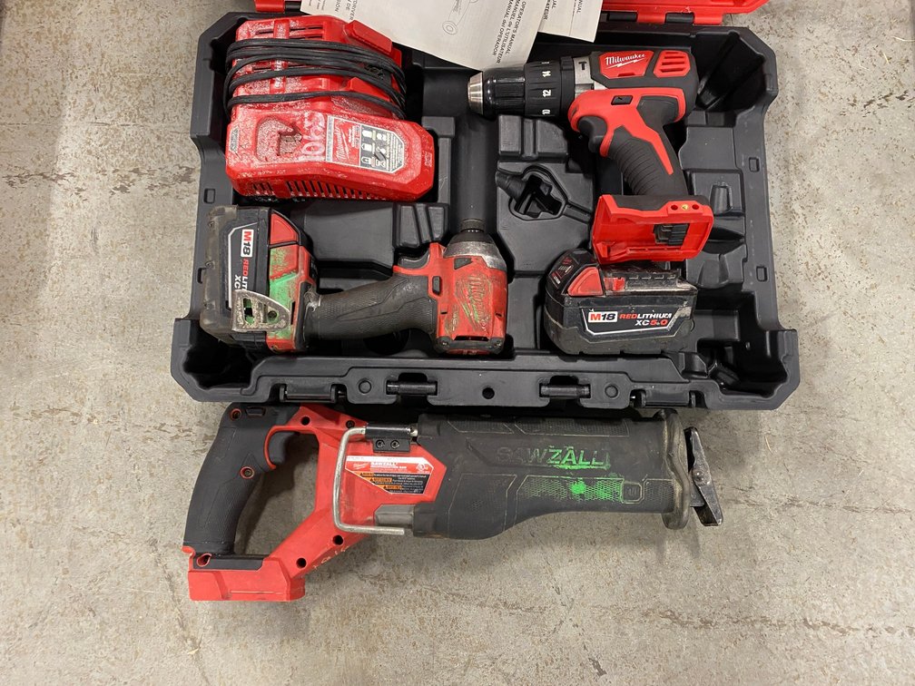 Milwaukee fuel impact drill battery charger kit with sawzall