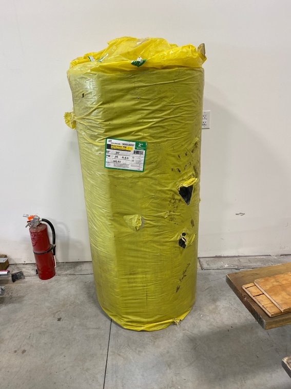Roll of 2" thick fiberglass duct liner