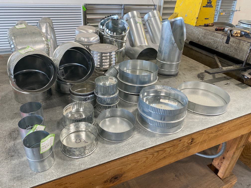 6" Take offs with 2" rises, assortment of 3" spiral couplings, spiral end caps