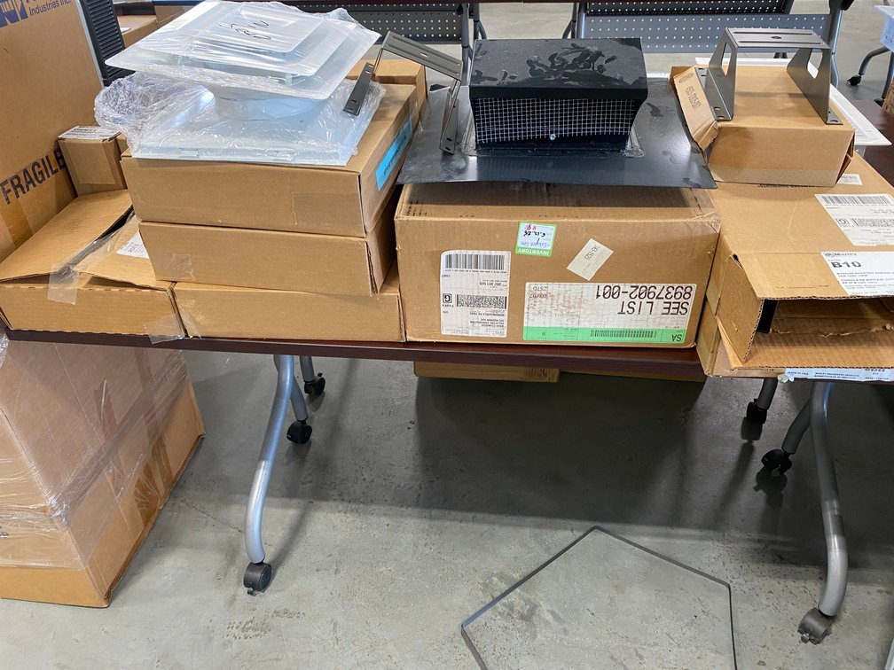 Assortment of ceiling diffusers, roof caps, mounting brackets, Marley heater hanger brackets