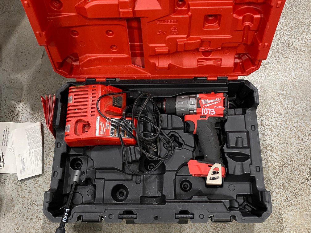 Milwaukee fuel drill with charger-battery not included