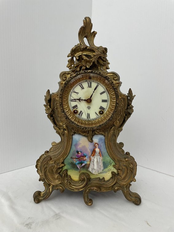 Cast metal Ansonia clock with ceramic insert painted with lady and gentleman-no key found