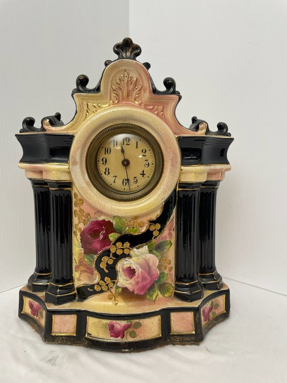 Antique hand painted porcelain clock decorated with roses and gold trim-with attached key