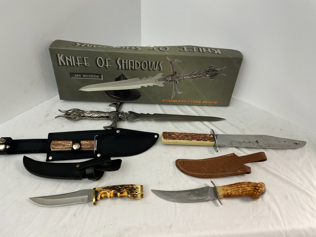 Group of knives-1 is stainless steel blade knife of The Shadows, a Cobra Hunter II, knife in case, Stauer knife in case
