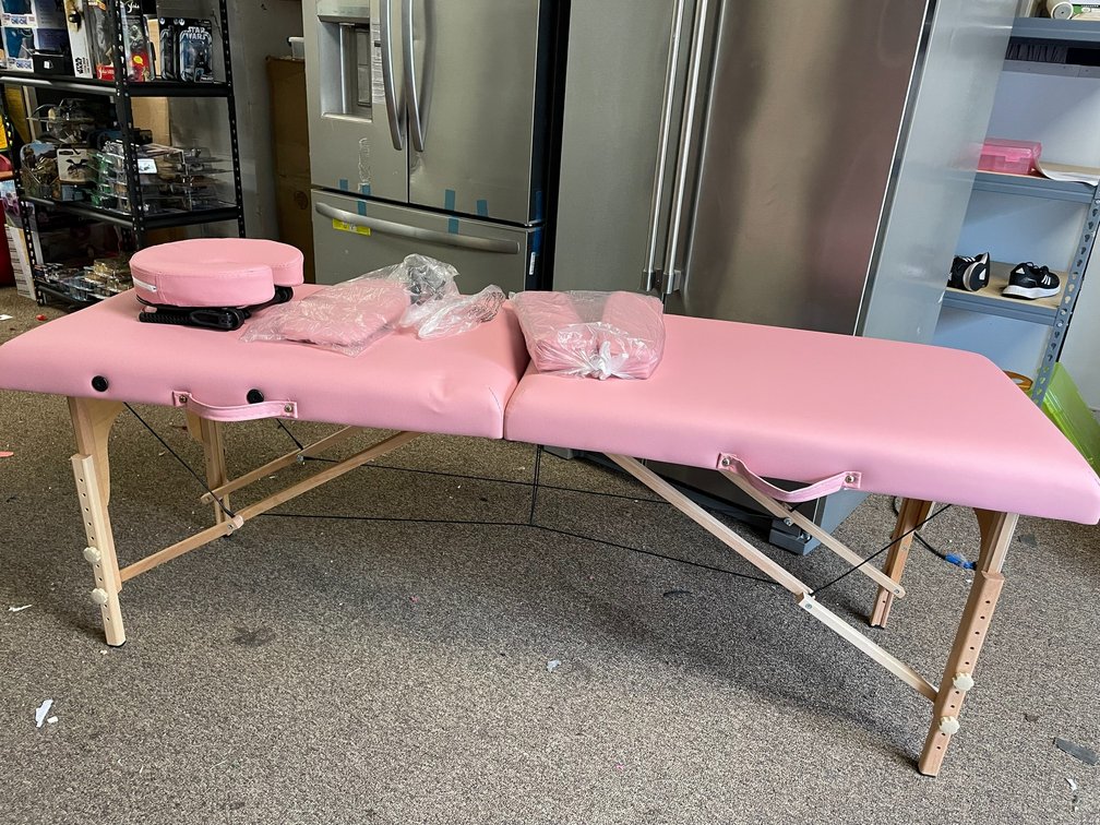 New in box portable pink massage table