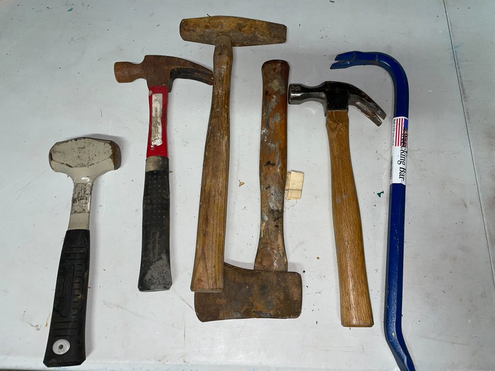 Claw hammer, framing hammer, hatchet, wrecking bar, 2 1/2 pound sledge hammer