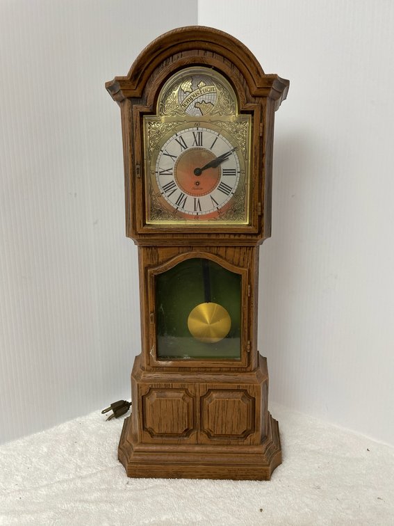 Miniature plastic grandfather clock by Sunbeam
