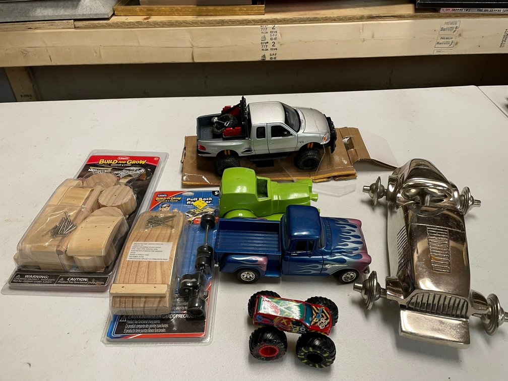 Die cast truck, 2 Build and Grow wooden car kits, cast metal car, cast metal F150 truck