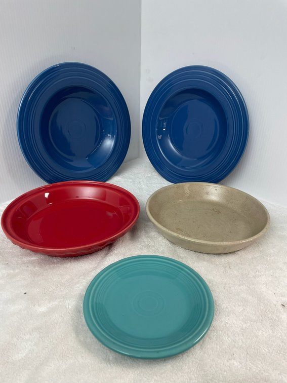 Several Fiesta bowls, 1 Roseville pie plate