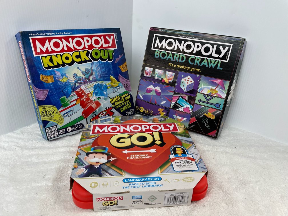 3 Monopoly games-Board Crawl, Monopoly Knock Out and Monopoly Go
